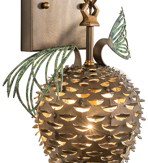 handcrafted pinecone wall sconce made in USA with ambient glow for western decor