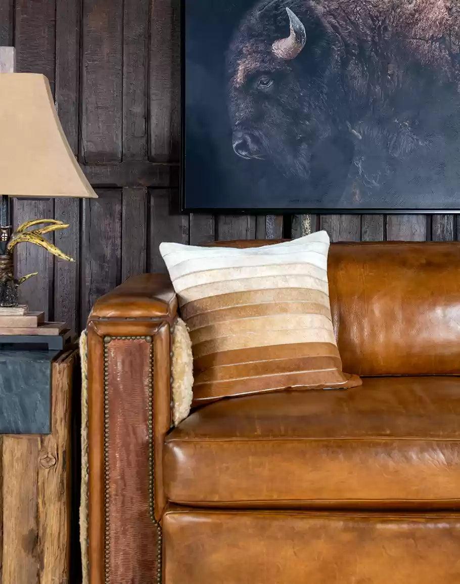 Beige Ombre Cowhide Throw Pillow in rustic room setting - Your Western Decor