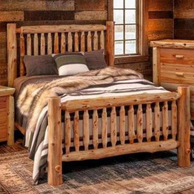 Premium natural cedar log bedroom furniture made in the USA with patterned bedding and rustic rug