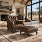 Rye Whiskey tufted western leather chair and ottoman staged in a luxury ranch living room with light wood beam ceilings, large windows, and neutral southwestern rug