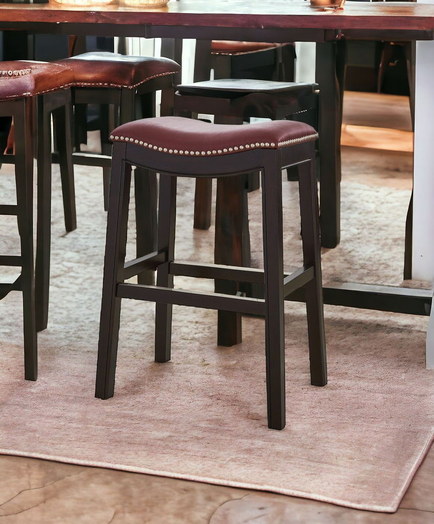Saddle style counter stool burgundy upholstery - Your Western Decor