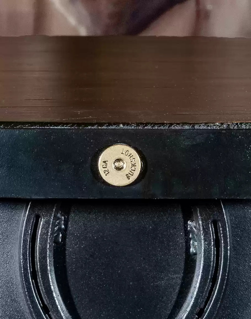 12 GA Buckshot shell caps on rustic western pub bar table - Your Western Decor