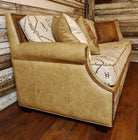 Side view of Mesa fabric and leather sofa with cowhide accents 