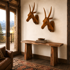 Sierra live edge sofa table crafted from solid Sheesham wood with double pedestal base in rustic lodge interior