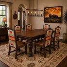 Southwestern dining room with Chief Joseph Sunset custom dining chairs, Gatekeeper area rug by Pendleton, and Watchful Buffalo Canvas Art