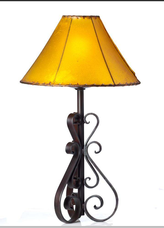 Spanish Forge iron table lamp with natural rawhide lamp shade