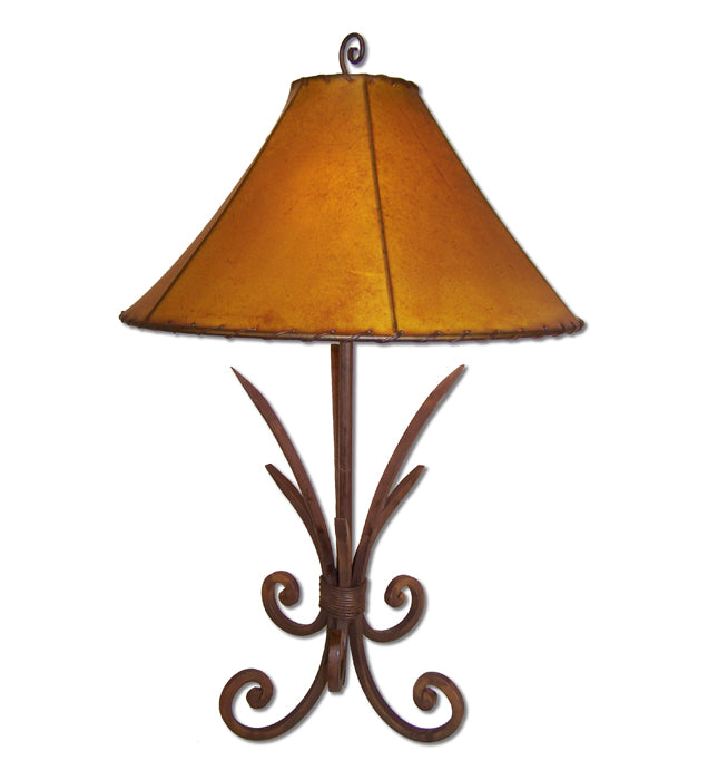 Spike forge iron table lamp with amber rawhide lamp shade 