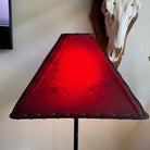 Square rawhide lamp shade with light on 