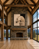 Stabled White Horse Canvas Art displayed above a stone fireplace in a luxury mountain lodge.