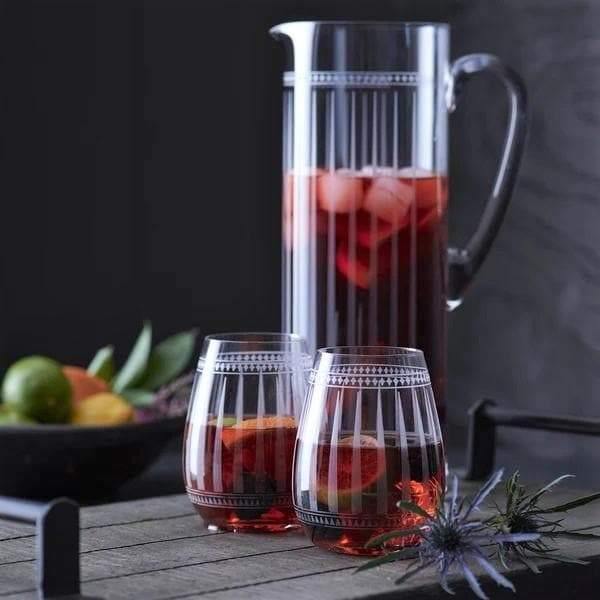 Crystal pitcher and stemless wine glasses. Your Western Decor