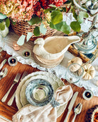 Stoneware turkey shaped gravy boat on festive table setting - Your Western Decor