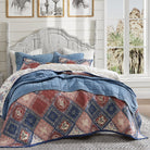 Bedding is stonewashed denim quilt set with Canyon Bandana Patchwork Quit Set