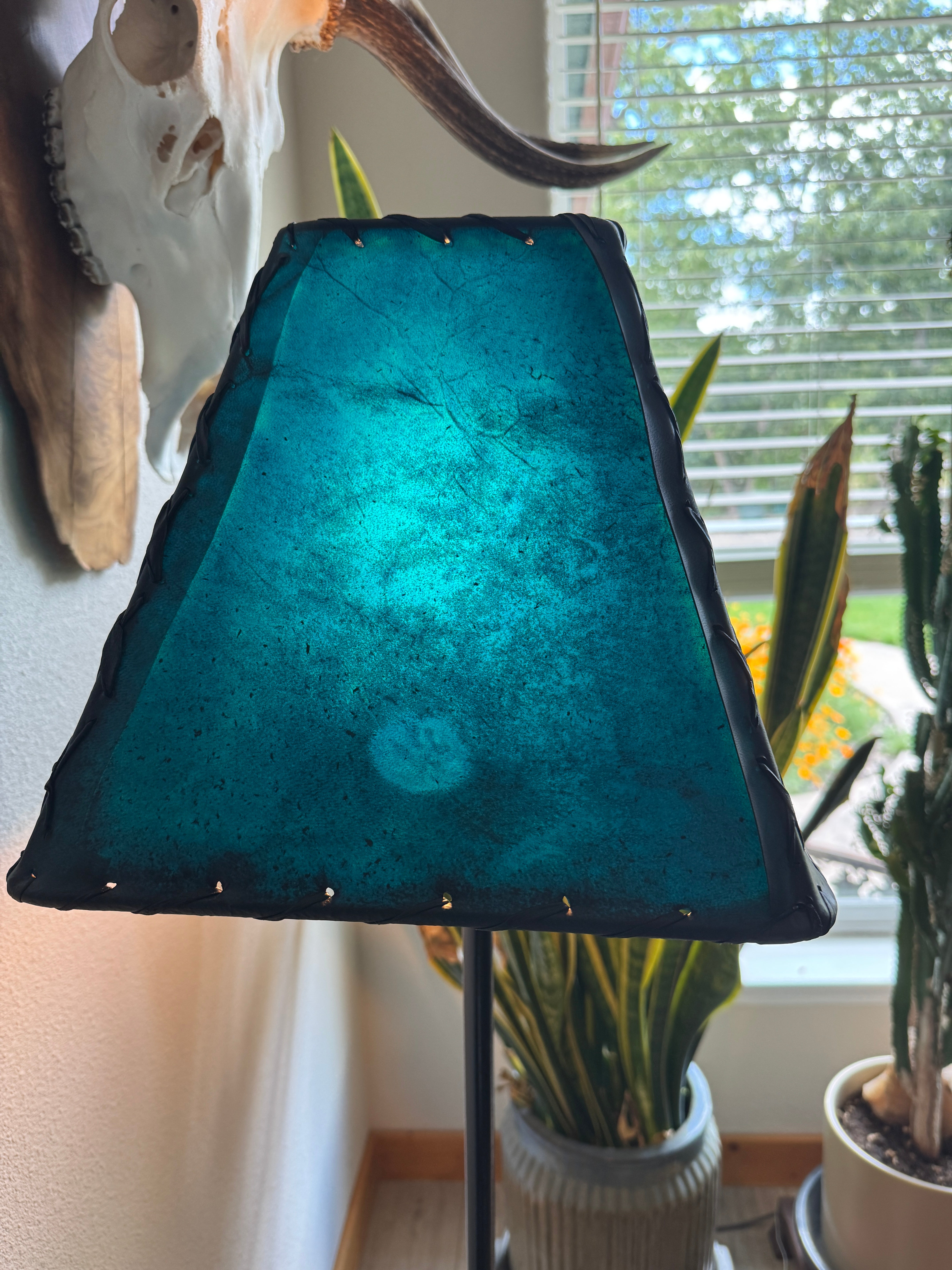 Handmade Southwestern rawhide lamp shade in rich teal finish