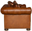 Close-up of Teton Chesterfield leather sofa tufted back and hand-applied nailhead trim