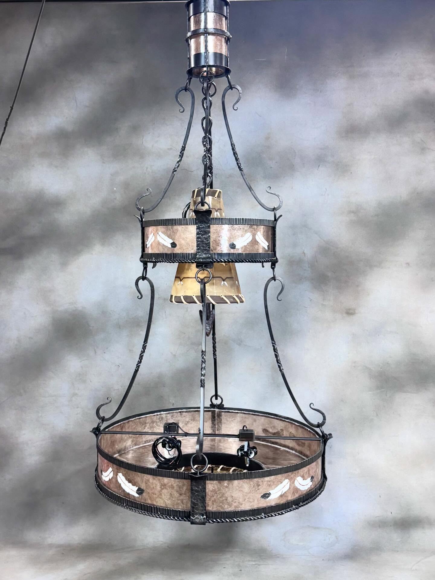 mica, iron, and rawhide 3-tier chandelier with hand-painted feathers