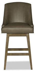 Brown leather bar stool with wooden legs on a white background