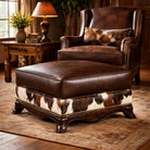 Hand crafted square ottoman with tri color cowhide and dark brown premium leather upholstery staged in a rustic living room room with leather accent chair 