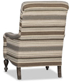 Striped armchair with a brown and beige pattern back view