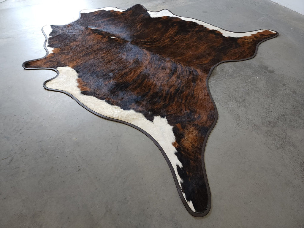 Tri color brindle cowhide with leather trim - Your Western Decor