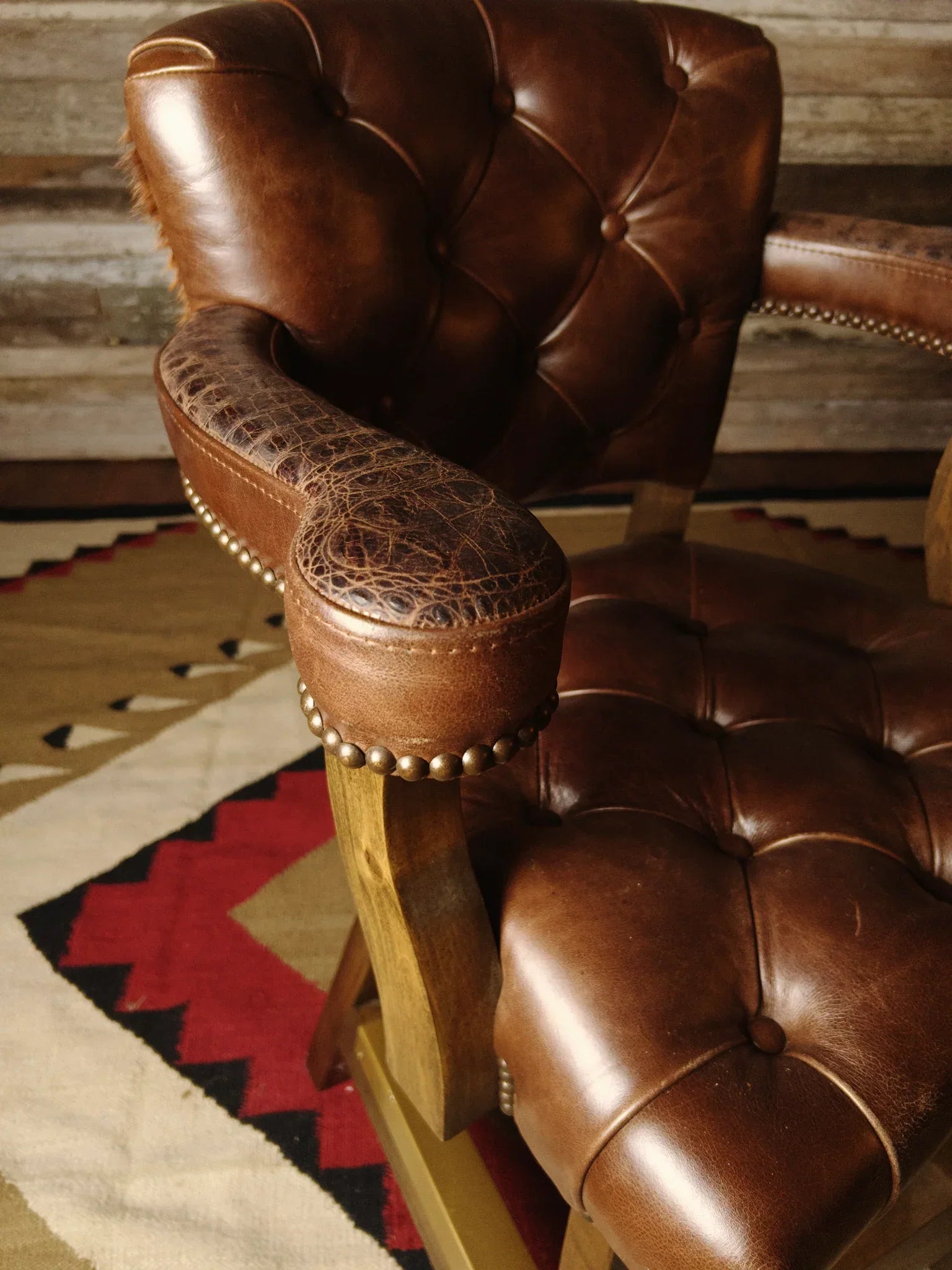 tufted leather barstool croc leather arm detail