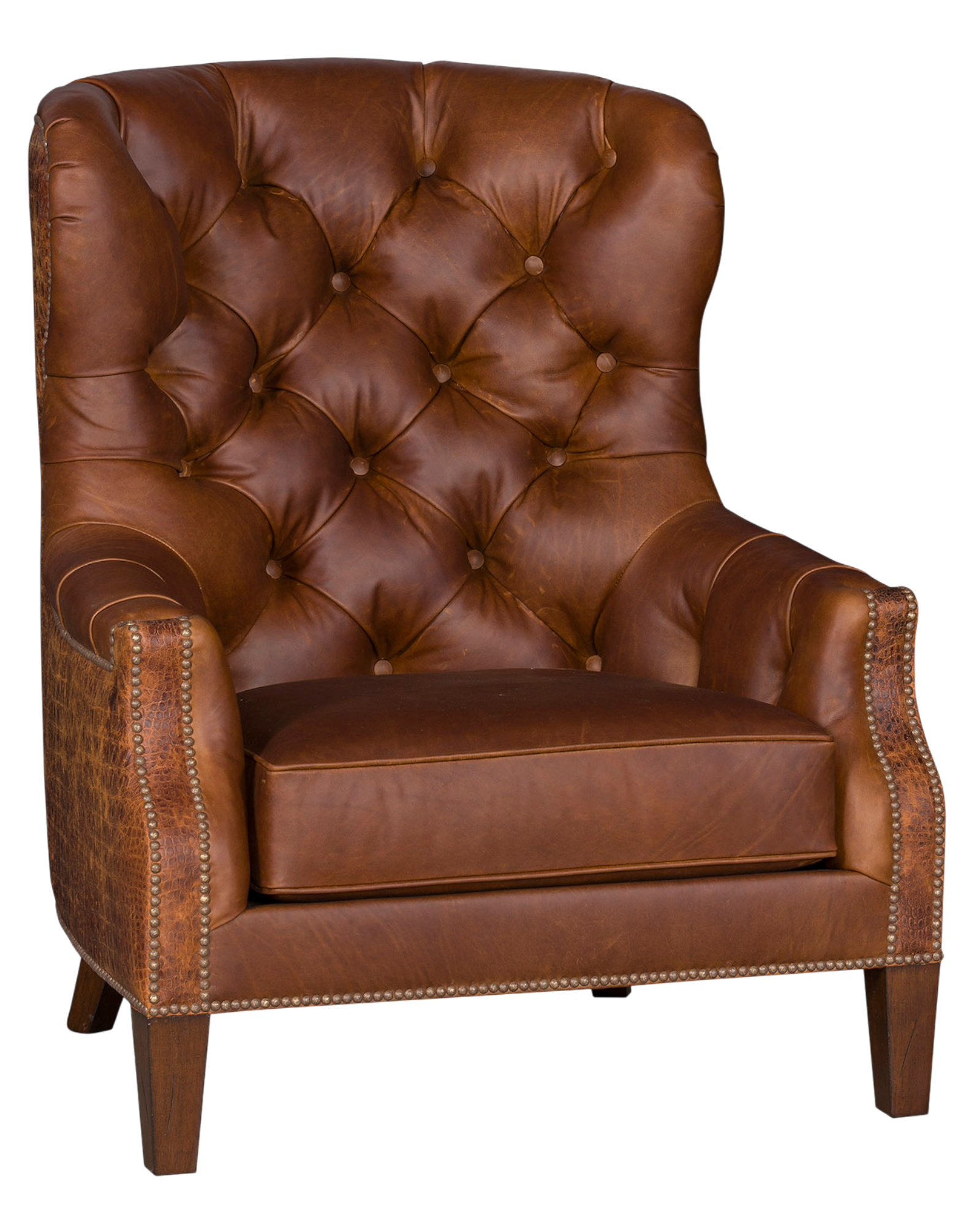Brown tufted leather wing chair with embossed leather outer and nail trim 