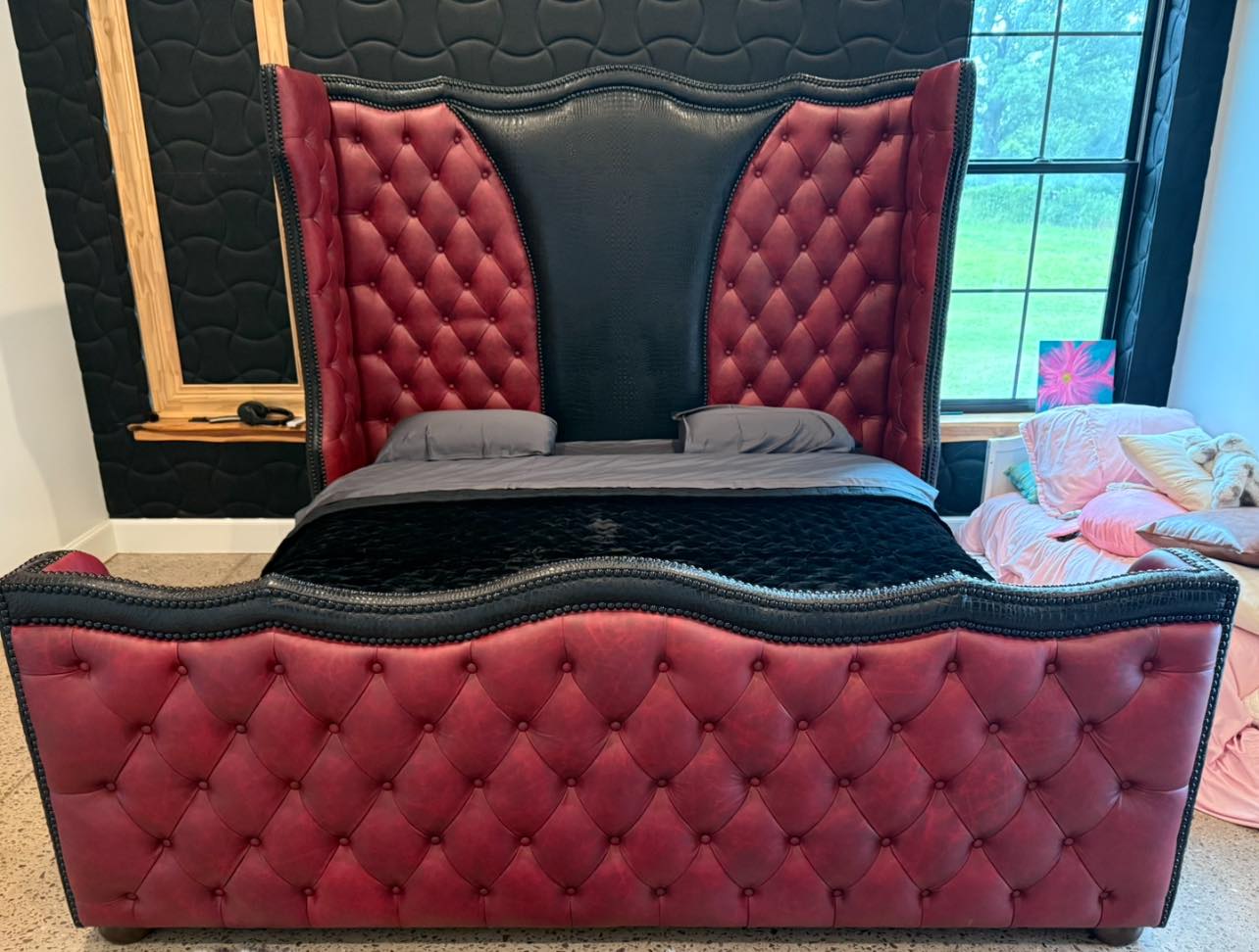 Tufted leather bed in smooth red leather and black croc embossed leather 