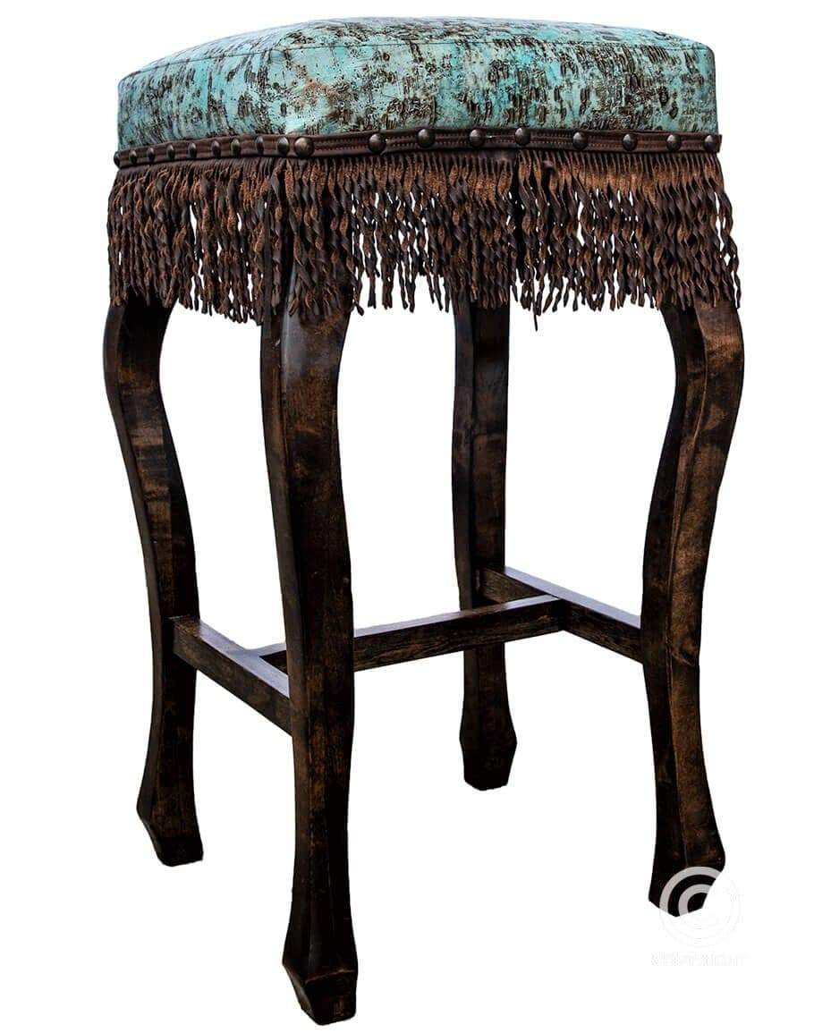 Fancy western bar stool with embossed turquoise leather and fringe. Alder wood frame. Made in the USA. Your Western Decor