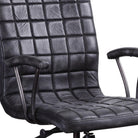 Upholstery detail on black leather office chair