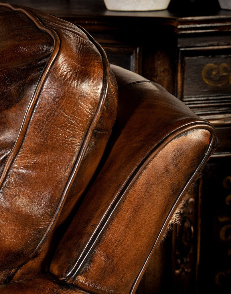 Burnished leather detail on USA made swivel glider - Your Western Decor
