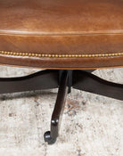 Office chair front detail with antiqued bronze tacking, made in the USA - Your Western Decor