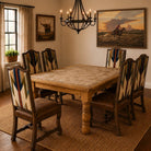 Western dining room with Glorious Freedom Canvas Art, Wyeth Trails Dining Chairs, and Lonestar Stone Inlay Dining Table. 