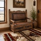Tooled leather storage bench displayed in bright Western ranch entryway