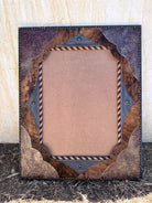 Western mirror with leather and cowhide upholstery, nail trim, with rope and star concho embellishments 