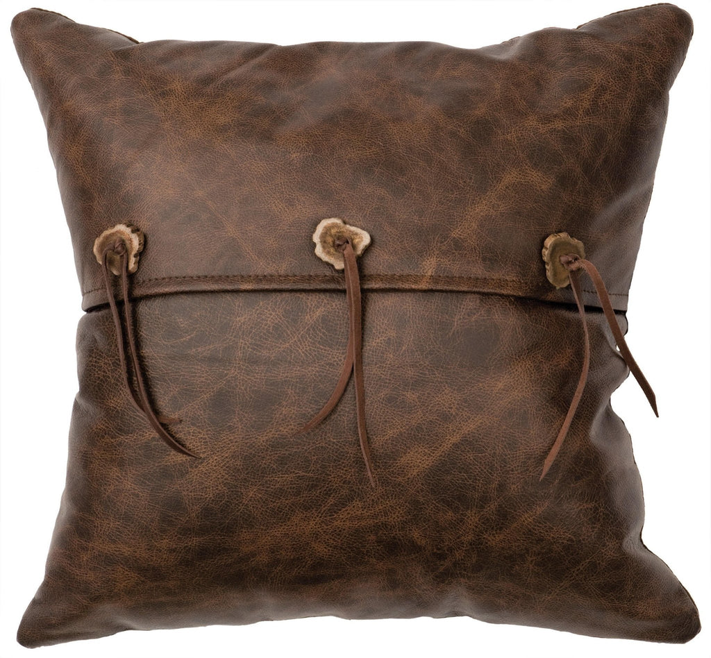 western leather throw pillow with deer hide tassels and antler slice buttons. Hand crafted in the USA. Your Western Decor