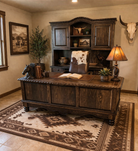 Western office with custom wood desk, credenza, and hutch with western office decor 