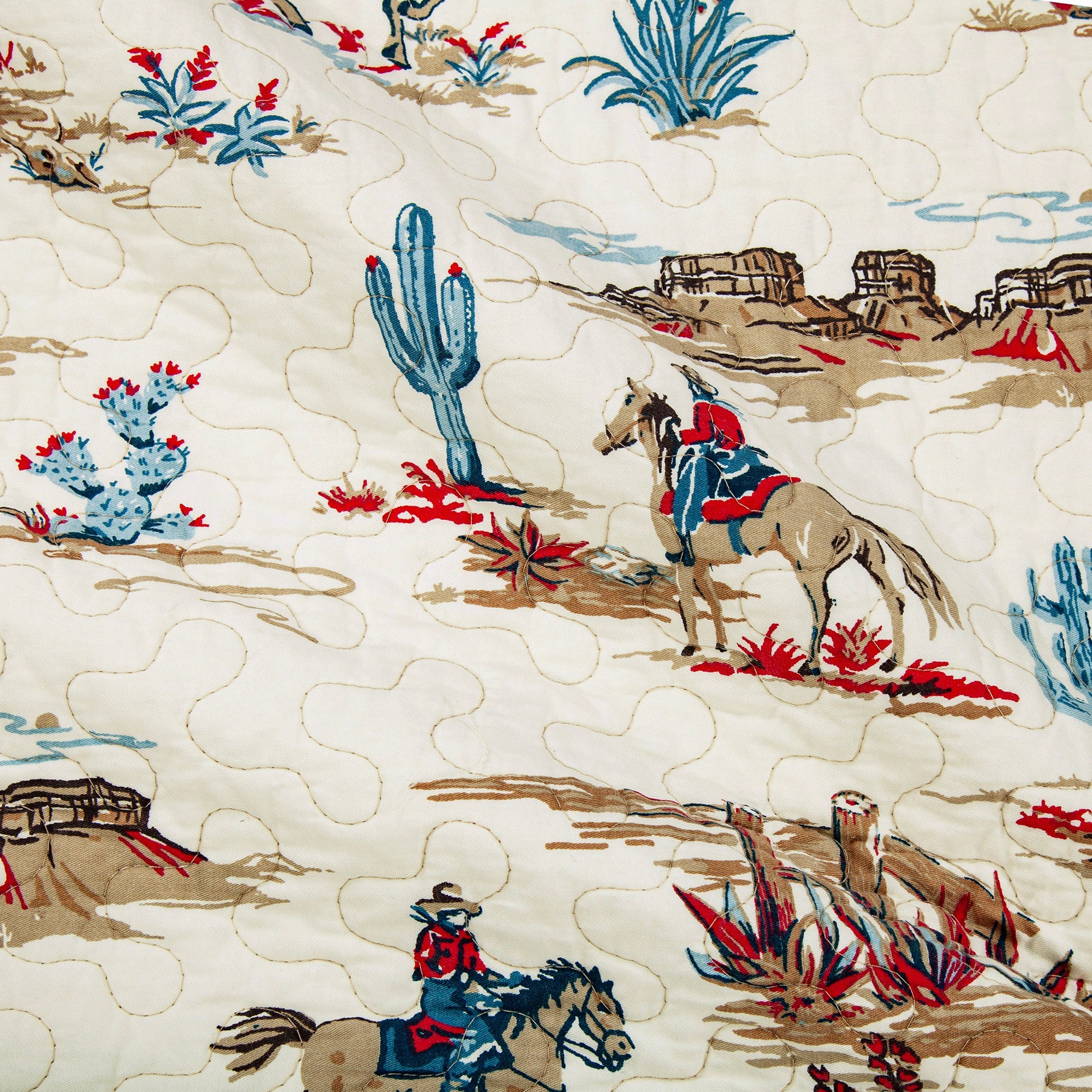 quilted pattern with cowboy and desert landscape pattern