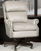 Ivory leather office chair in office - Your Western Decor