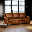American made Wilder Ranch leather sofa with embossed accent leather and button tufted front rail