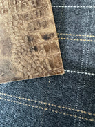 Designer grey wool windowpane fabric with matte-brown embossed leather