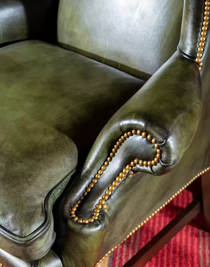 Olive green leather chair arm detail - Your Western Decor