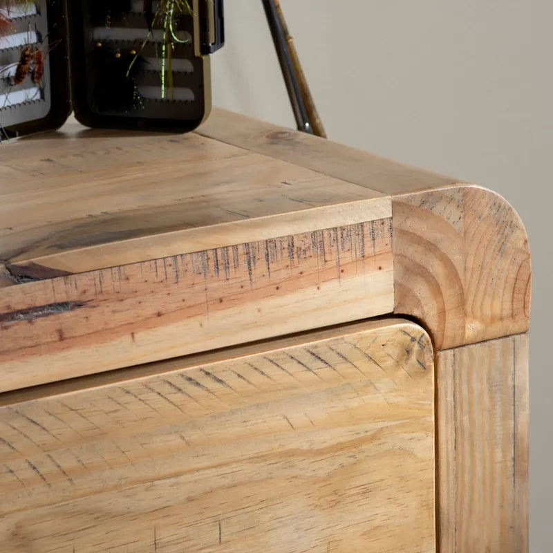 Wood grain detail of corner on console table 