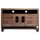 Wooden entertainment console with drawers and glass doors on a white background