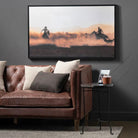 Working the Herd Western Art on wall above leather sofa - Your Western Decor