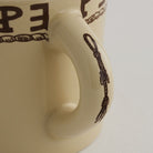 Handle detail of Yellowston coffee cup 