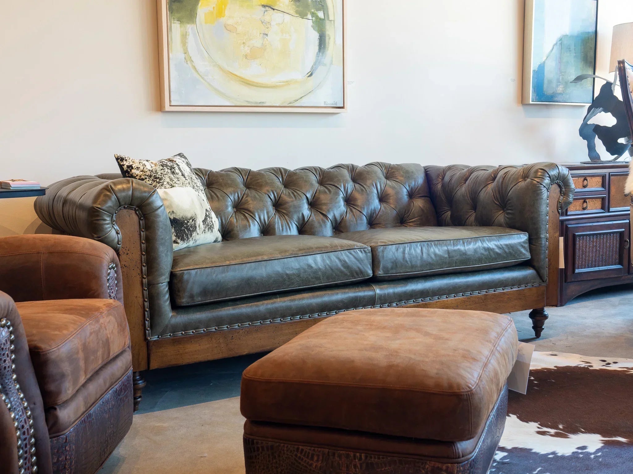 Yellowstone chesterfield leather sofa in showroom - Your Western Decor
