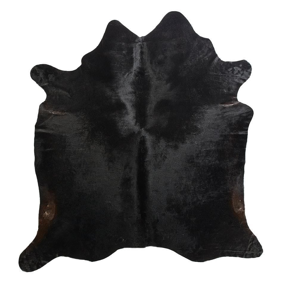 Black cowhide rug with brown tones - Your Western Decor