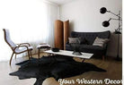 Black cowhide area rug