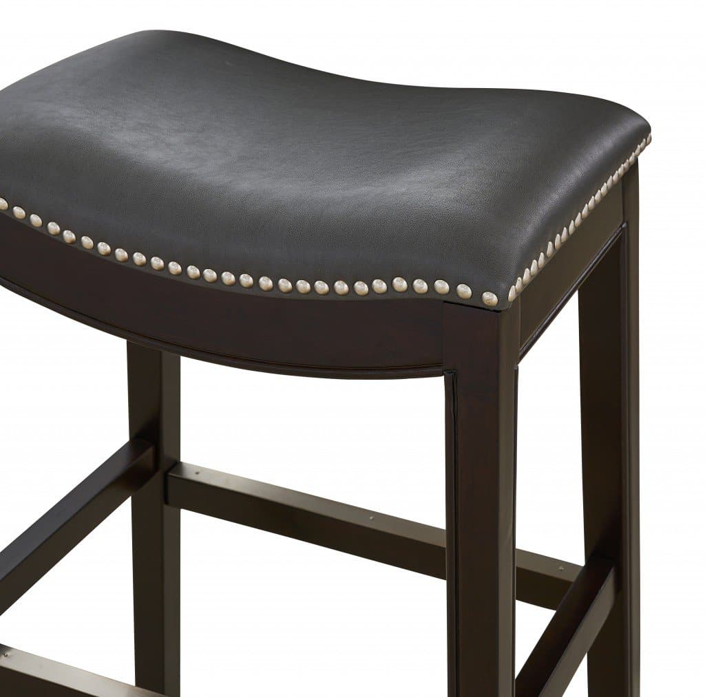 Dark grey saddle seat bar stool detail - Your Western Decor
