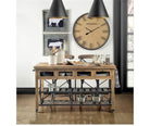 Rustic industrial mango wood kitchen island with iron shelves and locking wheels in farmhouse kitchen 