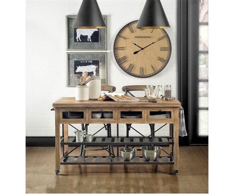 Rustic industrial mango wood kitchen island with iron shelves and locking wheels in farmhouse kitchen 